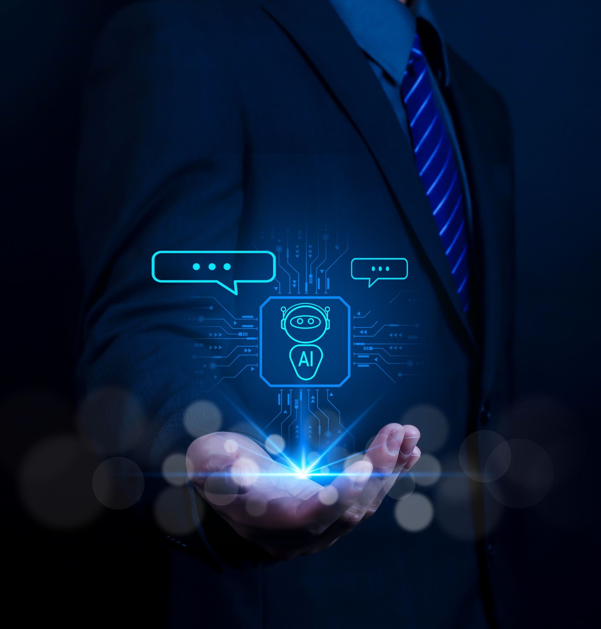 Businessman chatting with AI or artificial intelligence technology. A man uses a laptop computer to chat with an intelligent AI.